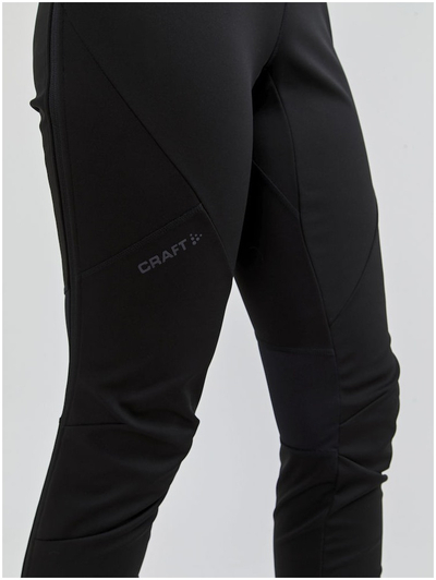 Pantallona sportive për goca Craft Glide FZ, softshell, me zinxhir anash, të zeza