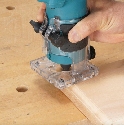 Frezë–trimer Makita DRT52SF LXT, pa kabllo, 18V 3Ah, me karikues