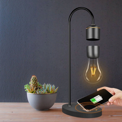 Llambë tavoline levituese me magnet LED, karikues wireless 10W, ngjyrë e artë
