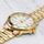 Orë burrash Casio MTP-VD01G-9EVUDF, 50m bo vaki me u lag, çelik inox gold, me unazë ngjyrë shampanje