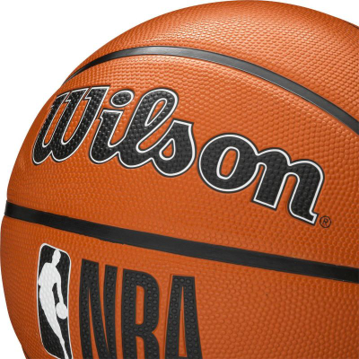 Top basketbolli Wilson NBA DRV Plus WTB9200XB për jashtë, portokalli