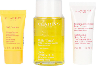 Set për kujdes trupit edhe ftyrës Clarins Spa at Home, 3 copë, vaj trupi 100 ml, skrab trupi 30 ml