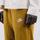 Pantallona dres Nike Club Jogger FT për burra, mustard e verdhë