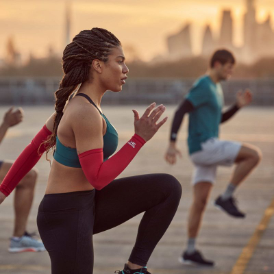 Mëngë kompresioni Reebok Arm Sleeves, set 2 copë, madhësia L, të kuqe