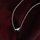 Qafore për femra Trussardi T-Logo, e argjendtë