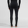 Leggins termo Odlo Active Warm, bazë termike, 100% poliester i ricikluar, të zeza