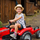 Traktor lodër me pedale Falk Massey Ferguson 8740S FA4010AB, me rimorkio, për kalamaj 3-7 vjeç, i kuq