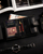Portofol për burra Peterson, lëkurë natyrale, me kapëse, i zi