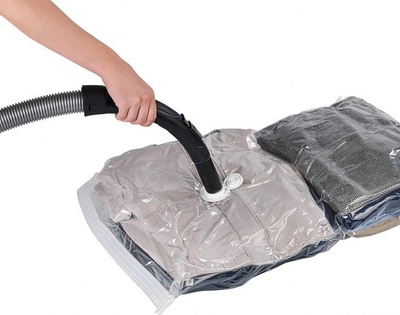 Qese vakum për rroba Wenko Vacuum Storage System, set 2 copë, 90 x 56 cm, transparente