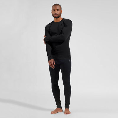 Leggins termo Odlo Active Warm, bazë termike, 100% poliester i ricikluar, të zeza