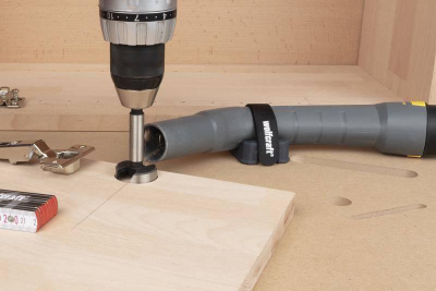 Mbajtës për zorrë fshese me korrent Wolfcraft, për tavolina Master, diametër 30-60 mm, i zi