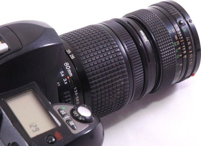 Adapter fotografic KiwiFotos Reverse Mounting Ring 55mm në 58mm, unazë metalike e zezë