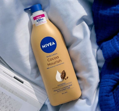 Locion trupi Nivea Cocoa Butter, 625 ml, hidratim 48 orë