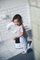 Детска тоалетна даска BabyBjörn Toilet Training Seat, прилагодлива, со рачка за закачување, бело сива