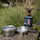 Set gatimi trekking nga çelik inox, tenxhere dhe tigan, doreza silikoni, gri