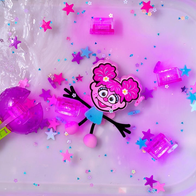 Lodër ndijimore me drita Glo Pals Sesame Street Abby Cadabby, për banjë, multingjyrëshe
