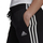 Долни тренерки за жени Adidas Essentials Tapered Cuffed