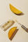 Vaj hidratues për buzë Dripping Gold Mango Gloss Lip Oil, 3.8 ml