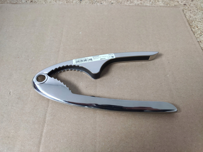 Thyes arrash Roesle Nutcracker, çelik inox, mekanizëm me sustë, argjent