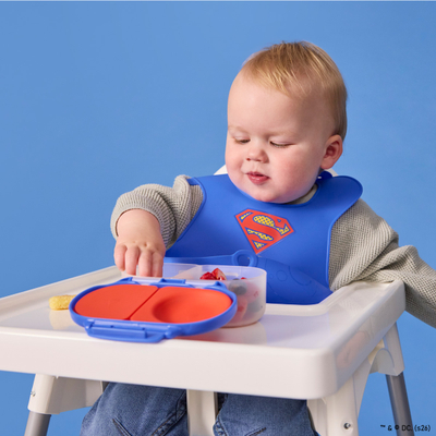 Babator silikon për bebe b.box Superman, xhep i thellë, i kaltër