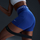 Shapka Nike Pro 365 për gra, Dri FIT, brez elastik, blu e bardhë