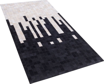 Tapet Beliani BOLU, lëkurë natyrale, 80x150 cm, bardh e zi