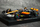 Maket makine F1 Bburago McLaren MCL60 2023 Oscar Piastri, shkalla 1:43, me helmetë, portokalli e zezë