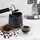 Enë për llumin e kafesë ORION Coffee Knock Box, kompakte, plastike, e zezë