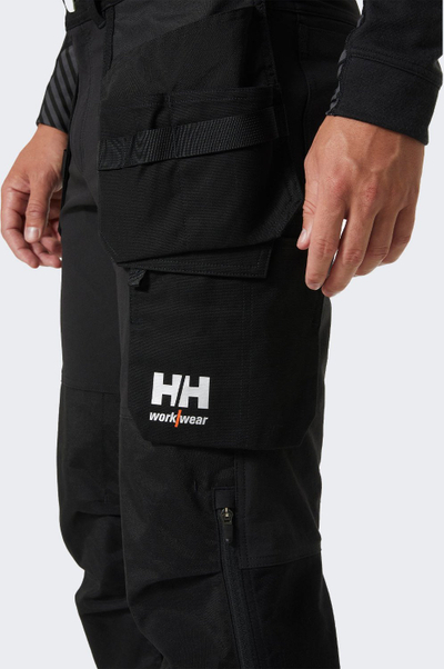 Pantallona pune Helly Hansen Workwear Oxford 4X Stretch me xhepa të varur, të zeza, C52