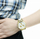 Orë dore Swatch YCG407G