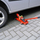 Fole hidraulike Carpoint Trolley Jack, 2000 kg, me rrota, e kuqe