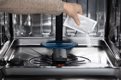 Pluhur enëlarëse Electrolux, detergjent për makina larëse, kuti