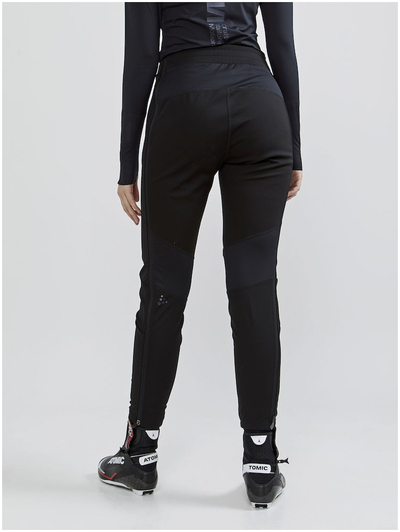 Pantallona sportive për goca Craft Glide FZ, softshell, me zinxhir anash, të zeza