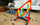 Set pistë lodër Hot Wheels Track Builder Unlimited Corkscrew Twist Kit, me makinë 1:64, shumëngjyrëshe