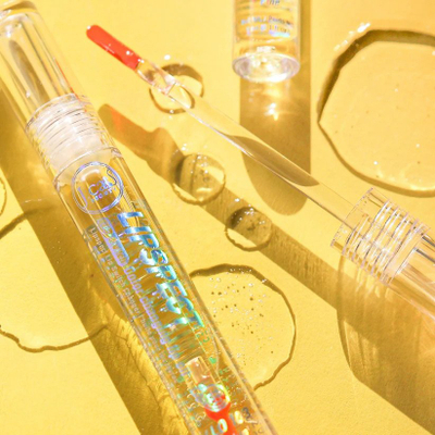 Lip gloss J.Cat Lipspect LLL105 Grape Mind Think Alive, me efekt që i ndërron ngjyra, me vaj argani