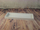 Tabaka dekorative prej druri për qirinj, 40 x 14 cm, e bardhë