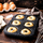 Formë metalike për muffin Klausberg KB-7840, për 6 muffin, veshje jo ngjitëse, e zezë