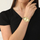 Orë dore për femra Lacoste, e artë
