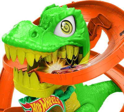 Set loje Hot Wheels City T-Rex Blaze Battle, pistë me dinosaurus, makinë 1:64, shumëngjyrëshe