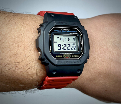 Orë dore për meshkuj Casio G-Shock x J Balvin DWE-5600R-9ER, e verdhë