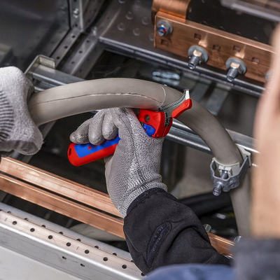 Thikë zhveshëse Knipex 16 50 145 SB, me këpucë udhëzuese, teh i palosshëm, e kuqe