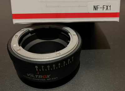 Adapter montimi Viltrox NF-FX1, Nikon F në Fujifilm X, kontroll diafragme, i zi