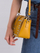 Çantë crossbody për goca Rovicky, lëkurë natyrale, me thumba, e verdhë