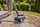 Pastrues dyshemeje GARDENA AquaBrush Patio 18V P4A, me bateri, për dysheme t’forta, portokalli