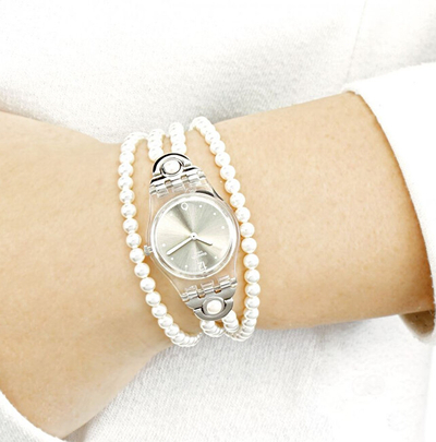 Orë dore Swatch Prohibition LK336