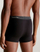 Mbathje për meshkuj Calvin Klein, të zeza/kuqe