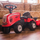 Traktor lodër McCormick Ride-on, me rimorkio, lopatë edhe hark, i kuq
