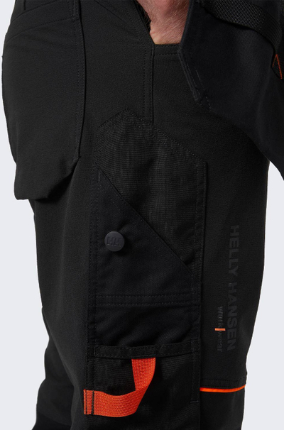 Pantallona pune Helly Hansen Chelsea Evo Brz Cons, me përforcime Cordura, me plot xhepa pune, ngjyrë e errët