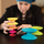 Lodër ndërtuese Fat Brain Toys Spoolz FBT181, set me 7 rrotulla, plastikë pa BPA, shumëngjyrëshe