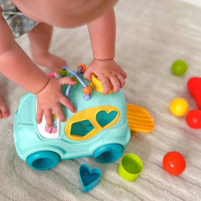 Lodër sorter muzikor Woopie Montessori, formë makine, me çekan dhe blloqe, shumëngjyrëshe